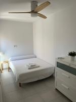 Posteľ alebo postele v izbe v ubytovaní Apartamento Primera Línea de playa