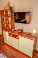 TV a/nebo společenská místnost v ubytování The Beach Apartment by Hello Homes Sitges