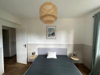 Ein Bett oder Betten in einem Zimmer der Unterkunft Le Plaisance, Beuil Les Launes
