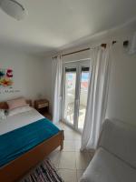Posteľ alebo postele v izbe v ubytovaní Apartments Edina
