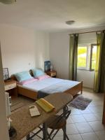 Posteľ alebo postele v izbe v ubytovaní Apartments Edina