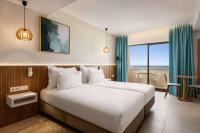Postel nebo postele na pokoji v ubytování Wyndham Residences Alvor Beach