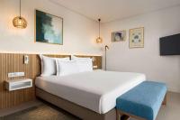 Postel nebo postele na pokoji v ubytování Wyndham Residences Alvor Beach