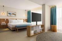 Postel nebo postele na pokoji v ubytování Wyndham Residences Alvor Beach