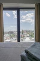 Green Eyes Apartmentsにあるベッド