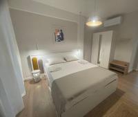 Posteľ alebo postele v izbe v ubytovaní Sea Esta Apartment