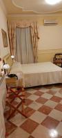 Hotel Trinacriaにあるベッド
