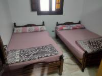 Postel nebo postele na pokoji v ubytování See view Alexandria شقة فندقية Free WI-FI