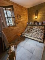 Posteľ alebo postele v izbe v ubytovaní La Boutame : chalet au pied des pistes à Villard Reculas