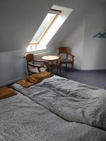 Postel nebo postele na pokoji v ubytování Kristinebjerg
