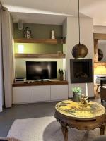 TV a/nebo společenská místnost v ubytování Beachhouse Zonneweelde