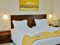Posteľ alebo postele v izbe v ubytovaní Aphrodite Beach