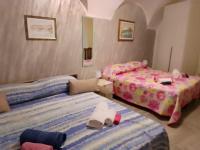 Posteľ alebo postele v izbe v ubytovaní Casa vacanze su sorighe.