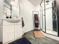 a bathroom with a sink and a shower at Bluepart 4 personnes in Chalons en Champagne