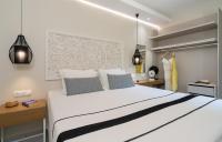 A bed or beds in a room at Blue View Villas