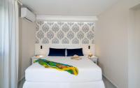 A bed or beds in a room at Blue View Villas