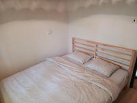 Postel nebo postele na pokoji v ubytování Slapy chata Županovice
