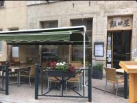 A restaurant or other place to eat at Logement au coeur de dole