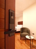 Ein Bett oder Betten in einem Zimmer der Unterkunft Muña Hotel Andahuaylas