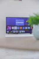 Green Eyes Apartmentsにあるテレビまたはエンターテインメントセンター