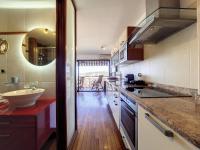 a kitchen with a sink and a counter top at Nestor&amp;Jeeves - HUBLOT TERRASSE - Sea view - swimming pool in Nice