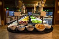 a buffet line with bowls of food on a table at Senza Grand Santana Hotel - Ultra All Inclusive in Mahmutlar