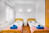 Posteľ alebo postele v izbe v ubytovaní Relax Les Palmeres