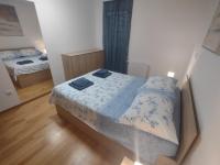 Posteľ alebo postele v izbe v ubytovaní Apartment By Verudela