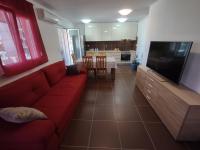 Televízia a/alebo spoločenská miestnosť v ubytovaní Apartment By Verudela