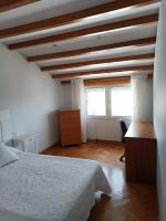 Postel nebo postele na pokoji v ubytování Apartamento Os Pineiros Cambados