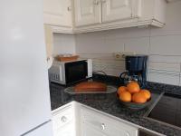 Kuchyň nebo kuchyňský kout v ubytování Apartamento Os Pineiros Cambados