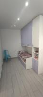 Posteľ alebo postele v izbe v ubytovaní Donna Beatrice aMare beach house
