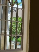 a window with a view of a palm tree at Mont Boron Exclusive Apartment in Villa Belle Époque in Nice