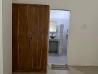 Kuta Circle Homestayにあるキッチンまたは簡易キッチン