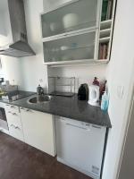 Kuchyň nebo kuchyňský kout v ubytování Penha Cozy Home