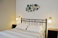 Posteľ alebo postele v izbe v ubytovaní Le Bassotte b&b