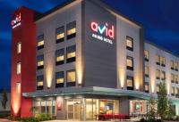 a building with a nord nursing hotel sign on it at avid hotel Augusta W - Grovetown by IHG in Grovetown