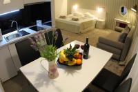 Postel nebo postele na pokoji v ubytování Studio Apartments Mirakul