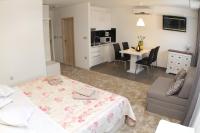 Postel nebo postele na pokoji v ubytování Studio Apartments Mirakul