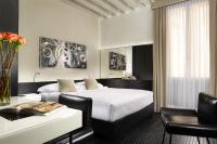 Hotel L'Orologio Venezia - WTB Hotelsにあるベッド