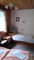 Postel nebo postele na pokoji v ubytování Hotel Nico