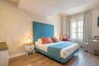 Postel nebo postele na pokoji v ubytování Hotel Palacete de Alamos