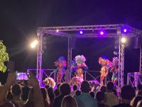 a crowd of people watching a show at night at L&#39;écrin du Cap Esterel in Saint-Raphaël