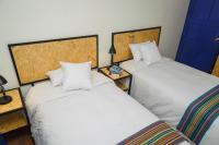 Cama o camas de una habitación en Saqray Hostel