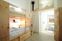 Postel nebo postele na pokoji v ubytování The Hat Madrid