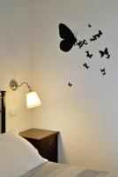 Posteľ alebo postele v izbe v ubytovaní Le Bassotte b&b