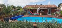 a home with a pool and a house at MAISON &amp; PISCINE PRIVES,PLAGES OCEAN ET LAC A 10 kms in Linxe