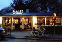 a group of bikes parked in front of a restaurant at Landhaus Jenischpark in Hamburg