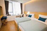 Fraser Place Namdaemun Seoulにあるベッド