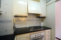 Kuchyň nebo kuchyňský kout v ubytování GRECIA 2 D - apartamento